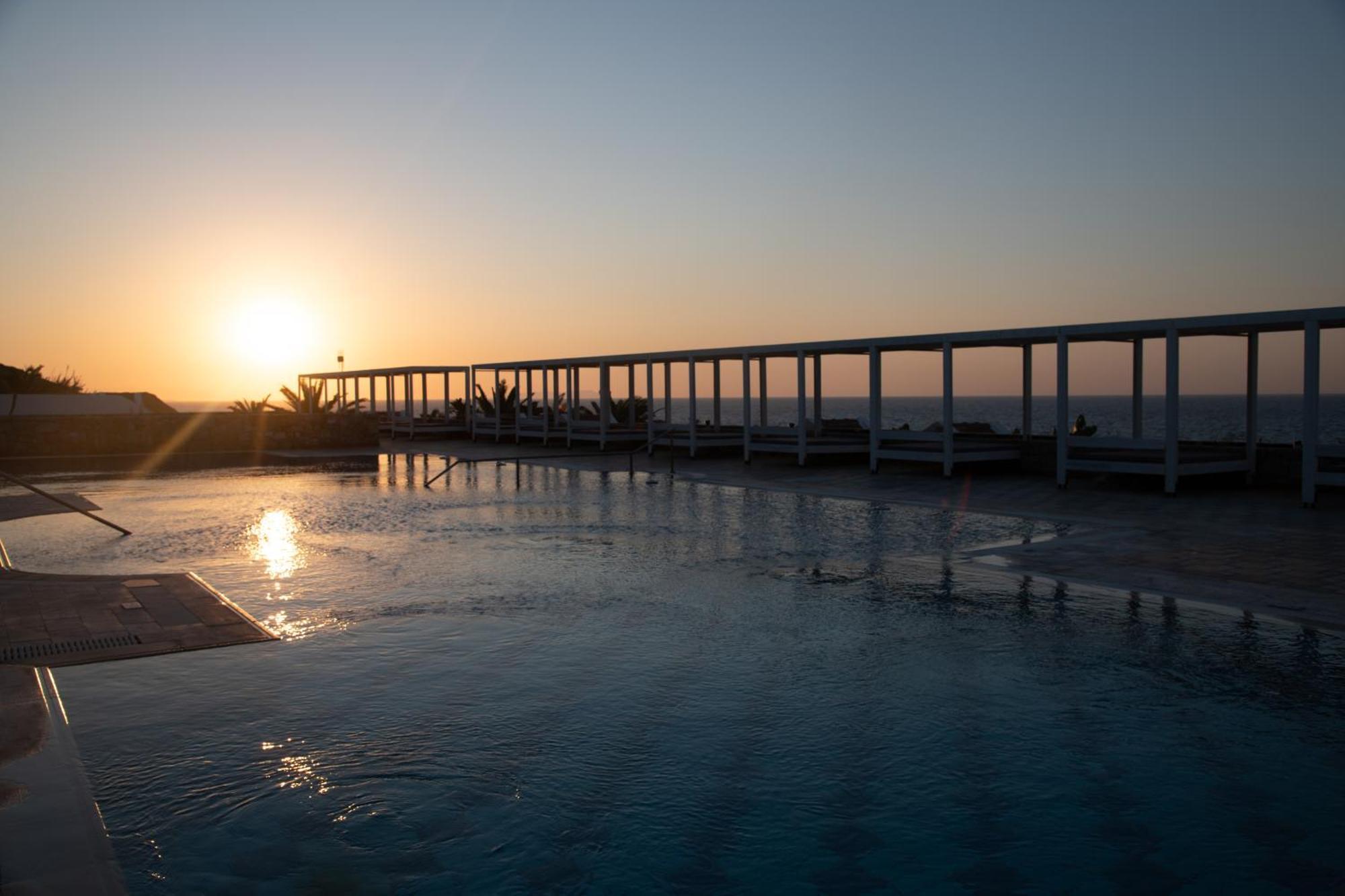 Minos Imperial Luxury Beach Resort & Spa Milatos Exterior photo The pier at sunset